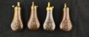 079-0321-0992, Lot of collectible pistol flasks. Fine to excellent overall. BUY NOW