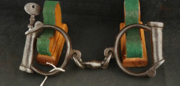 GR-0324-6052, Old Pair of Handcuffs with key in unique but simple mechanics. BLOWOUT