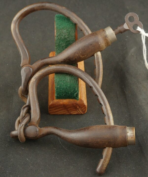 J79-1124-8665 Caveny Invention Co handcuffs with Key. BLOWOUT