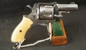 079-0625-9308, Continental .32 CF, folding trigger factory engraved revolver. BLOWOUT