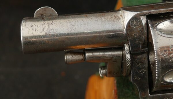 079-0625-9308, Continental .32 CF, folding trigger factory engraved revolver. BLOWOUT - Image 11