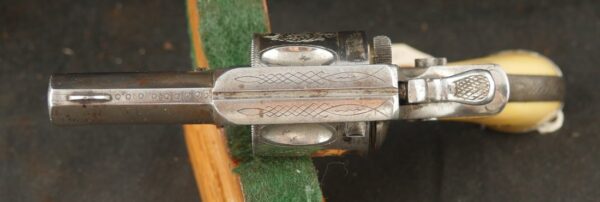 079-0625-9308, Continental .32 CF, folding trigger factory engraved revolver. BLOWOUT - Image 4