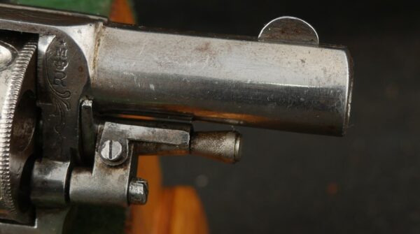 079-0625-9308, Continental .32 CF, folding trigger factory engraved revolver. BLOWOUT - Image 5
