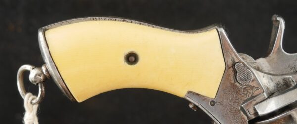 079-0625-9308, Continental .32 CF, folding trigger factory engraved revolver. BLOWOUT - Image 7