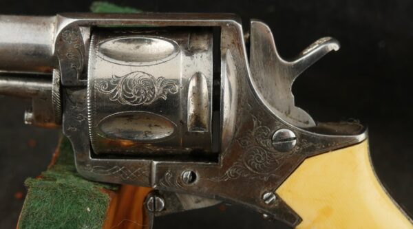 079-0625-9308, Continental .32 CF, folding trigger factory engraved revolver. BLOWOUT - Image 12
