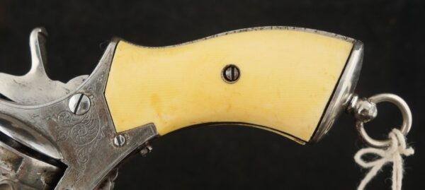 079-0625-9308, Continental .32 CF, folding trigger factory engraved revolver. BLOWOUT - Image 13