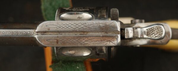 079-0625-9308, Continental .32 CF, folding trigger factory engraved revolver. BLOWOUT - Image 15