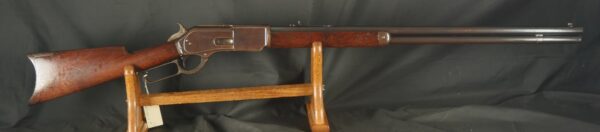 079-0825-D0250, Winchester M-1876 Early 2nd Model round barrel with Thumb Print Dust Cover. BUY NOW