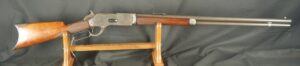 079-0825-D0255, Winchester M-1876 Round Barrel Rifle in 45-75 in rare Open Top frame construction. BUY NOW