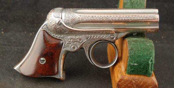 GR-0925-6648, Wonderful Remington Elliot 5 shot pepperbox in .22 RF with exceptional dealer deluxe engraving and silver finish. BUY NOW - Image 2
