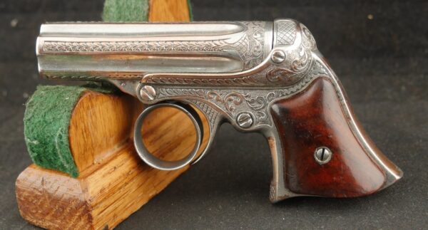GR-0925-6648, Wonderful Remington Elliot 5 shot pepperbox in .22 RF with exceptional dealer deluxe engraving and silver finish. BUY NOW - Image 4