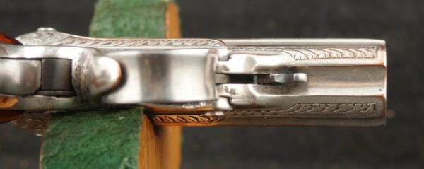 GR-0925-6648, Wonderful Remington Elliot 5 shot pepperbox in .22 RF with exceptional dealer deluxe engraving and silver finish. BUY NOW - Image 17